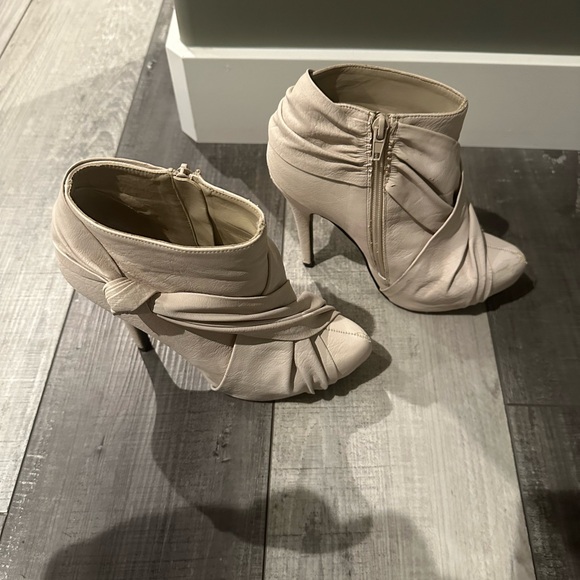 Cream 3 inch heel booties. Size 6. A few scuffs. Zippers work perfectly. - Picture 3 of 5